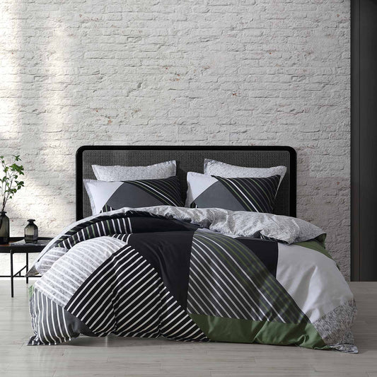 Noah Charcoal is a new colourway in a classic design. The design uses shades of grey to create an urban look and is highlighted by olive; an SS23 seasonal colour. The reverse compliments the design in a monochromatic silver texture.