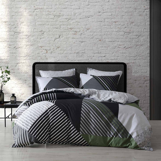 Noah Charcoal is a new colourway in a classic design. The design uses shades of grey to create an urban look and is highlighted by olive; an  SS23 seasonal colour. The reverse compliments the design in a monochromatic silver texture.